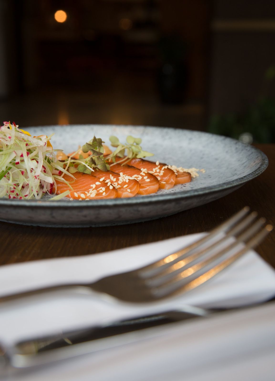 Cured salmon with sesame and a shaved radish salad