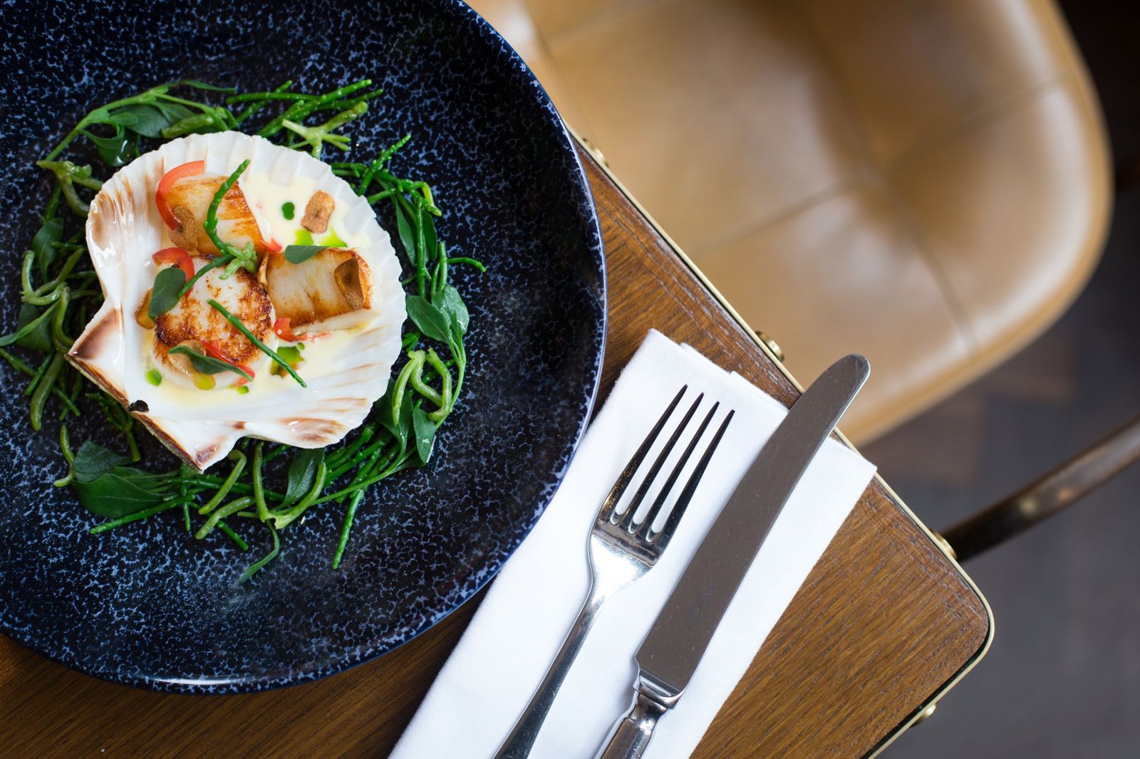 Seared scallops in the shell with samphire, from above