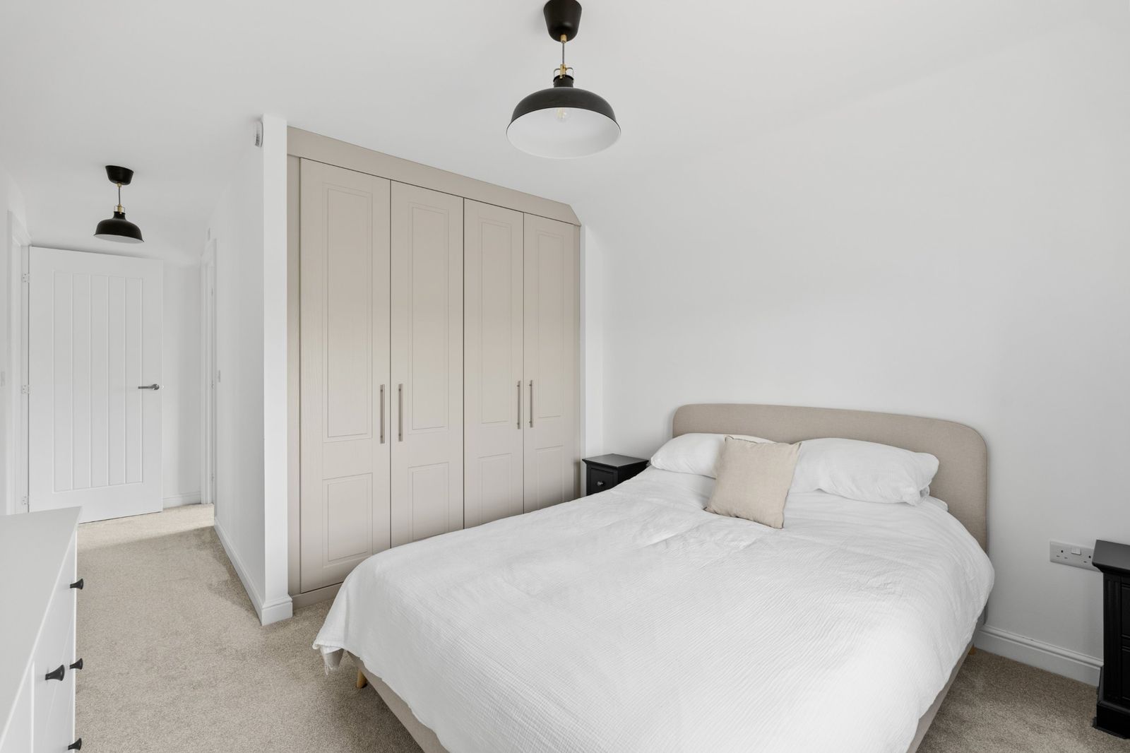 The main bedroom with fitted wardrobes