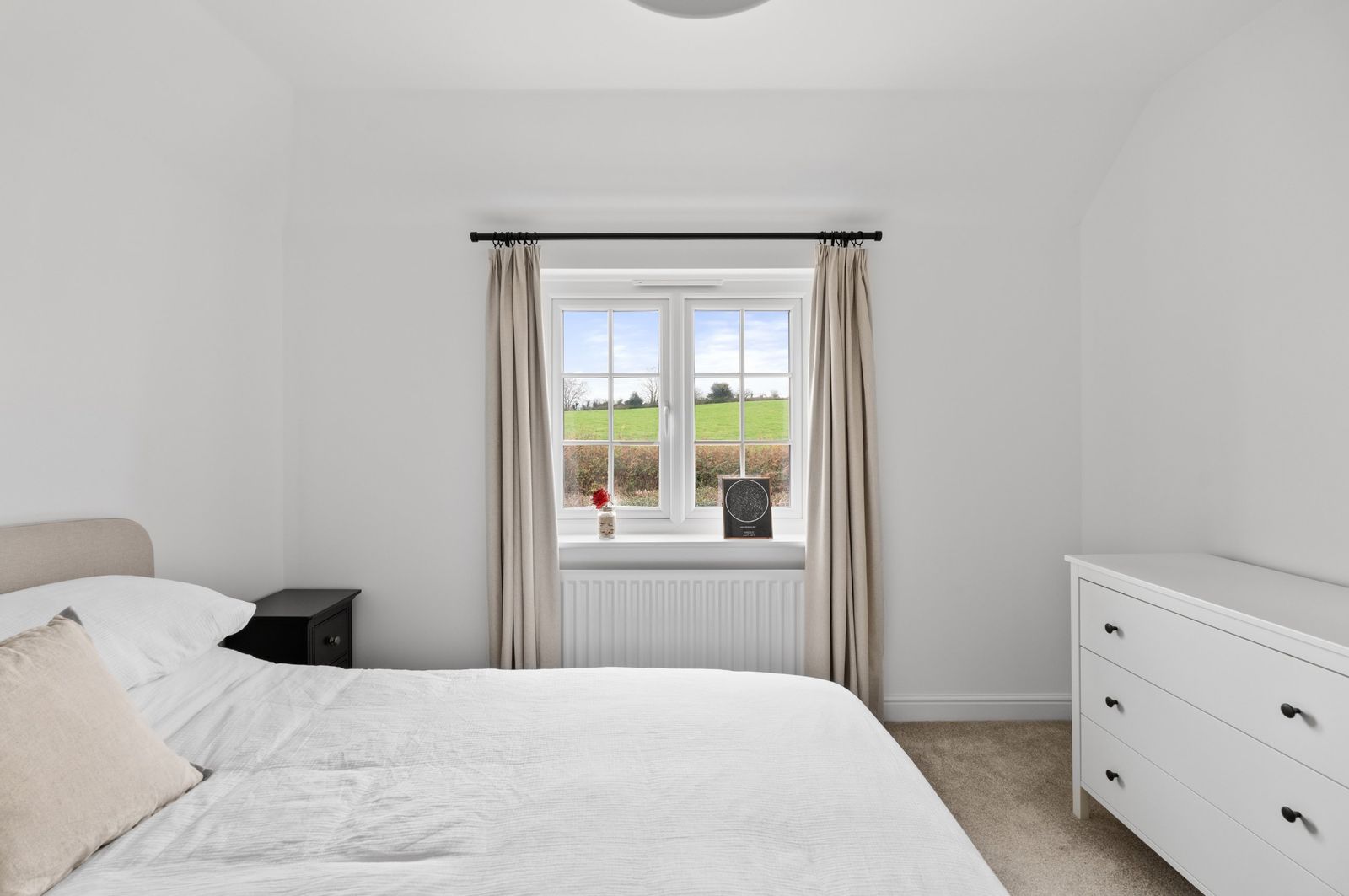 The main bedroom window looking over the fields