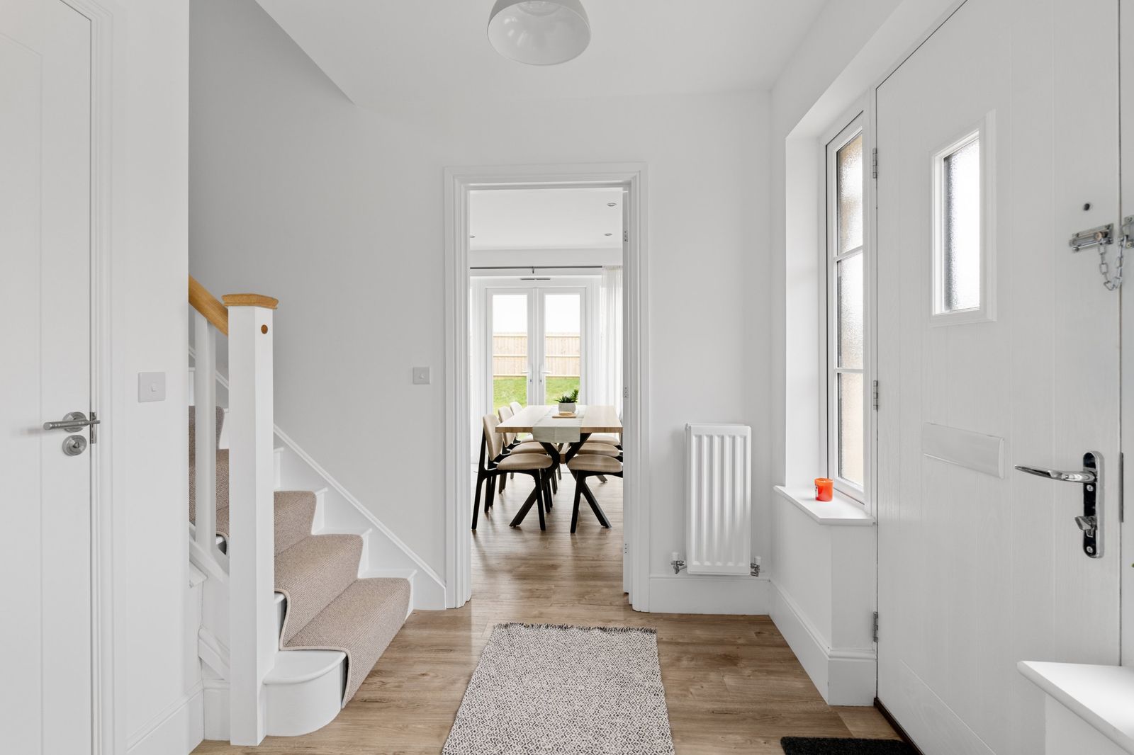 The entrance hall looking through to the dining room