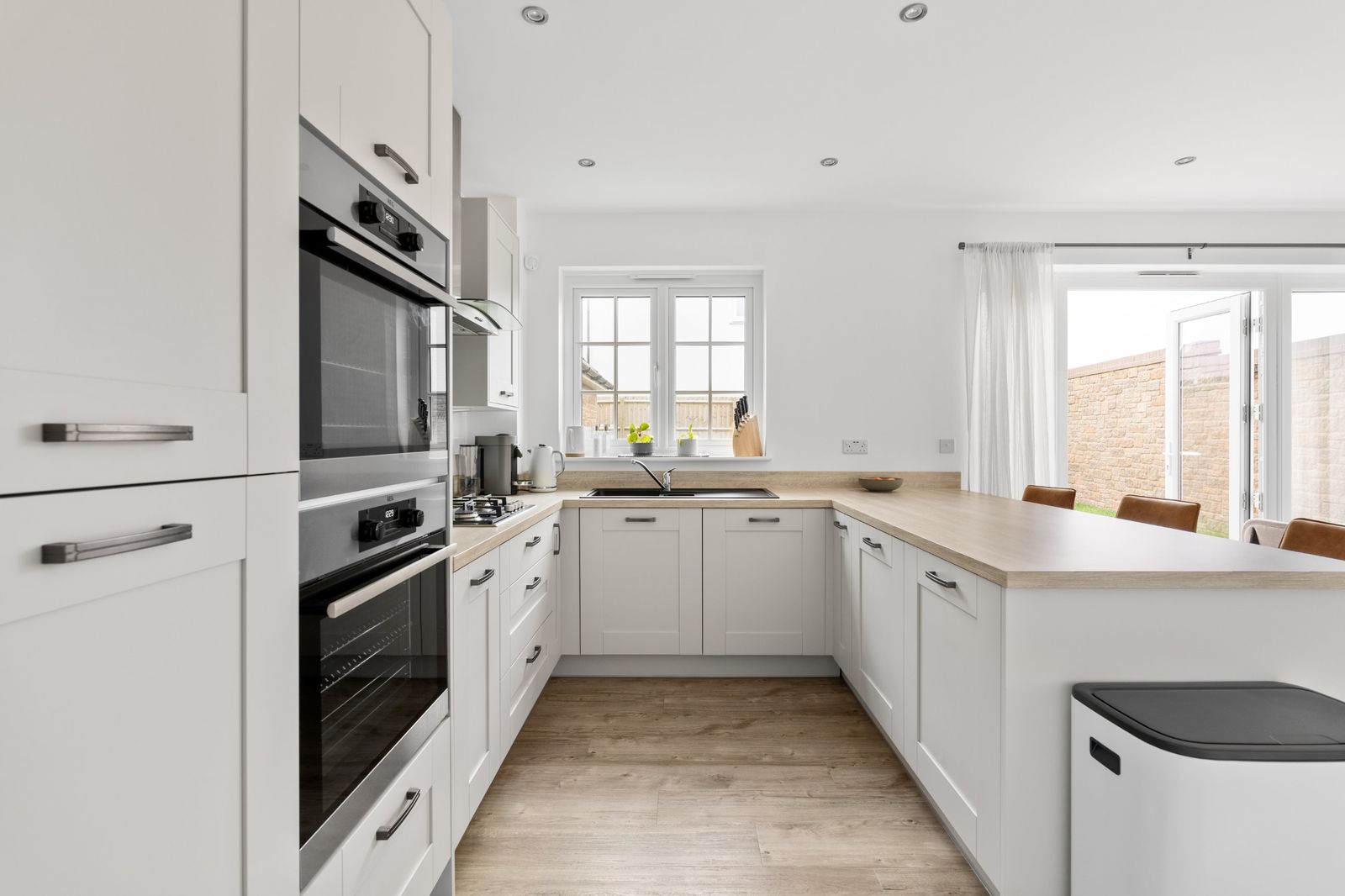 The kitchen with built-in ovens