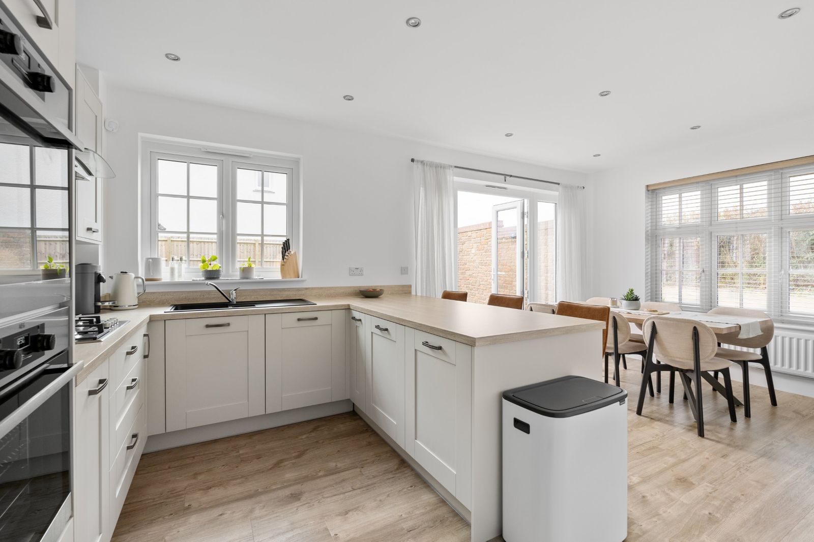 The kitchen and dining area in the morning light