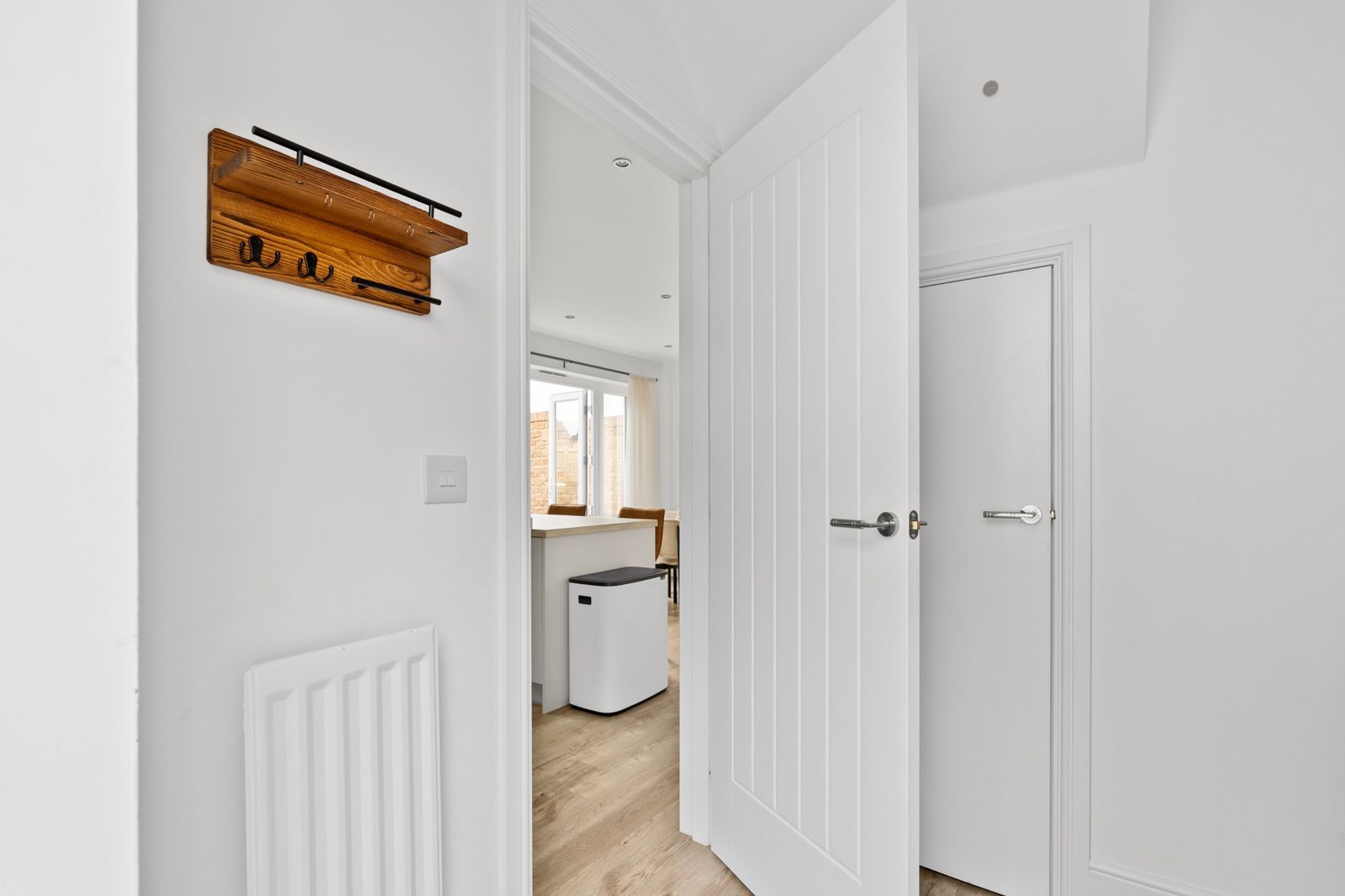 The rear hall leading into the kitchen