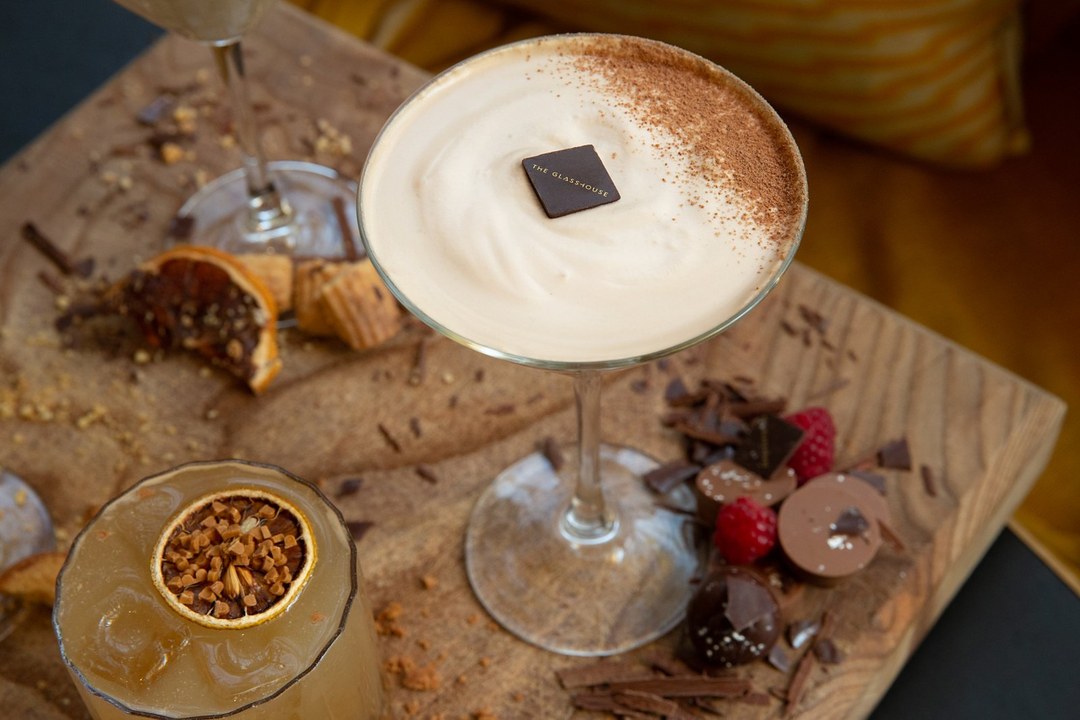 A chocolate martini with handmade chocolates