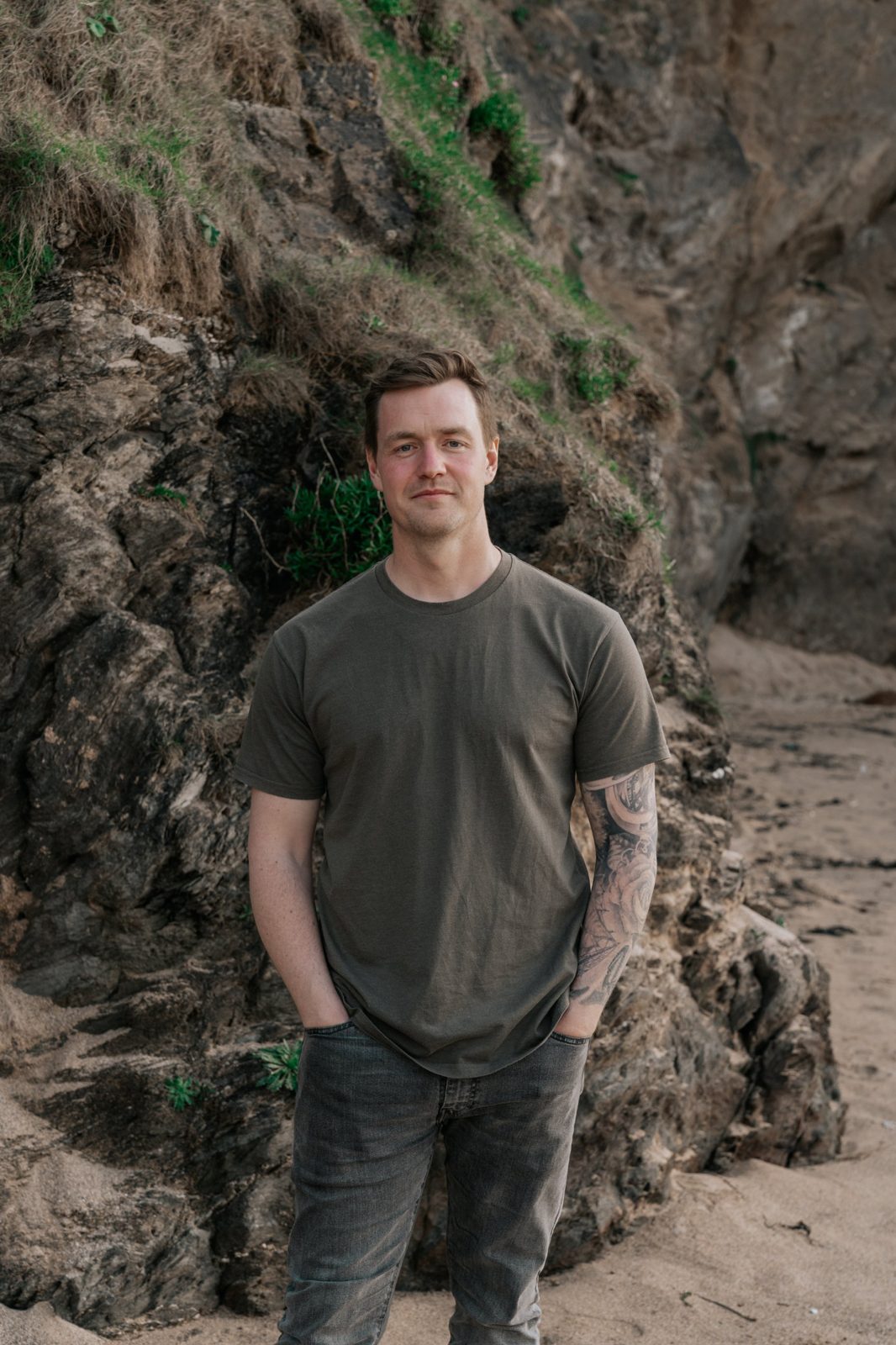 Martin, videographer at Shoreline Bay Studios, on a beach in Cornwall