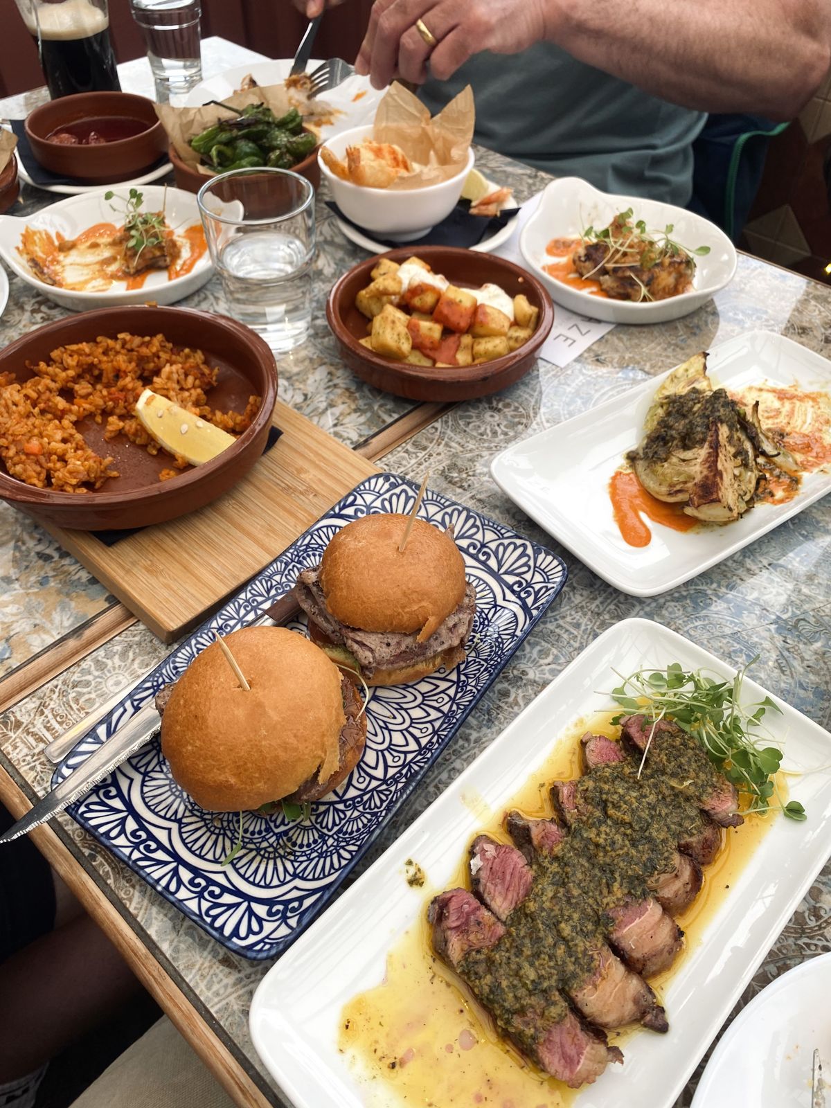 A table full of tapas plates, sliders and steak at Graze in Newquay