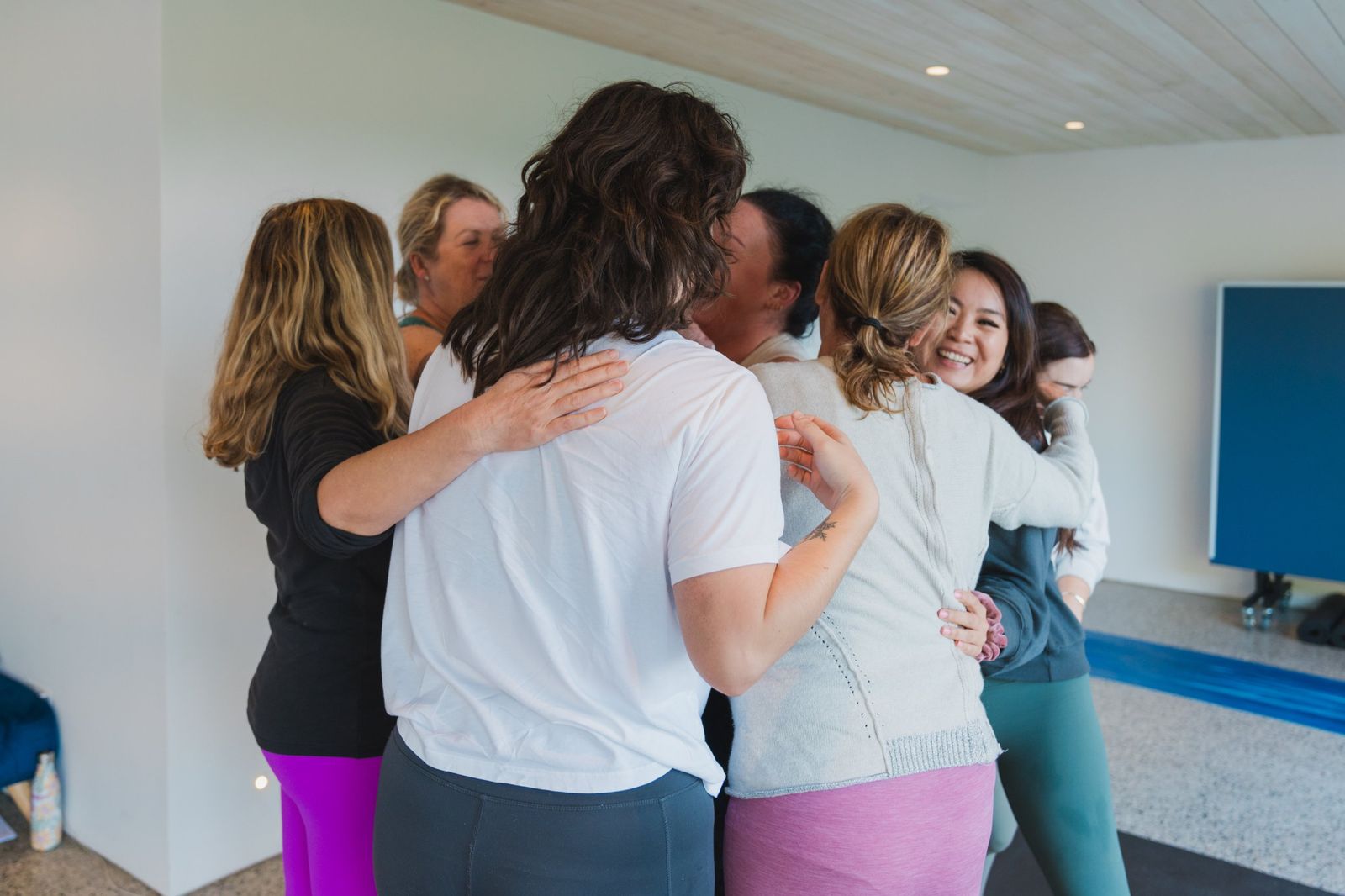 The whole group in a hug