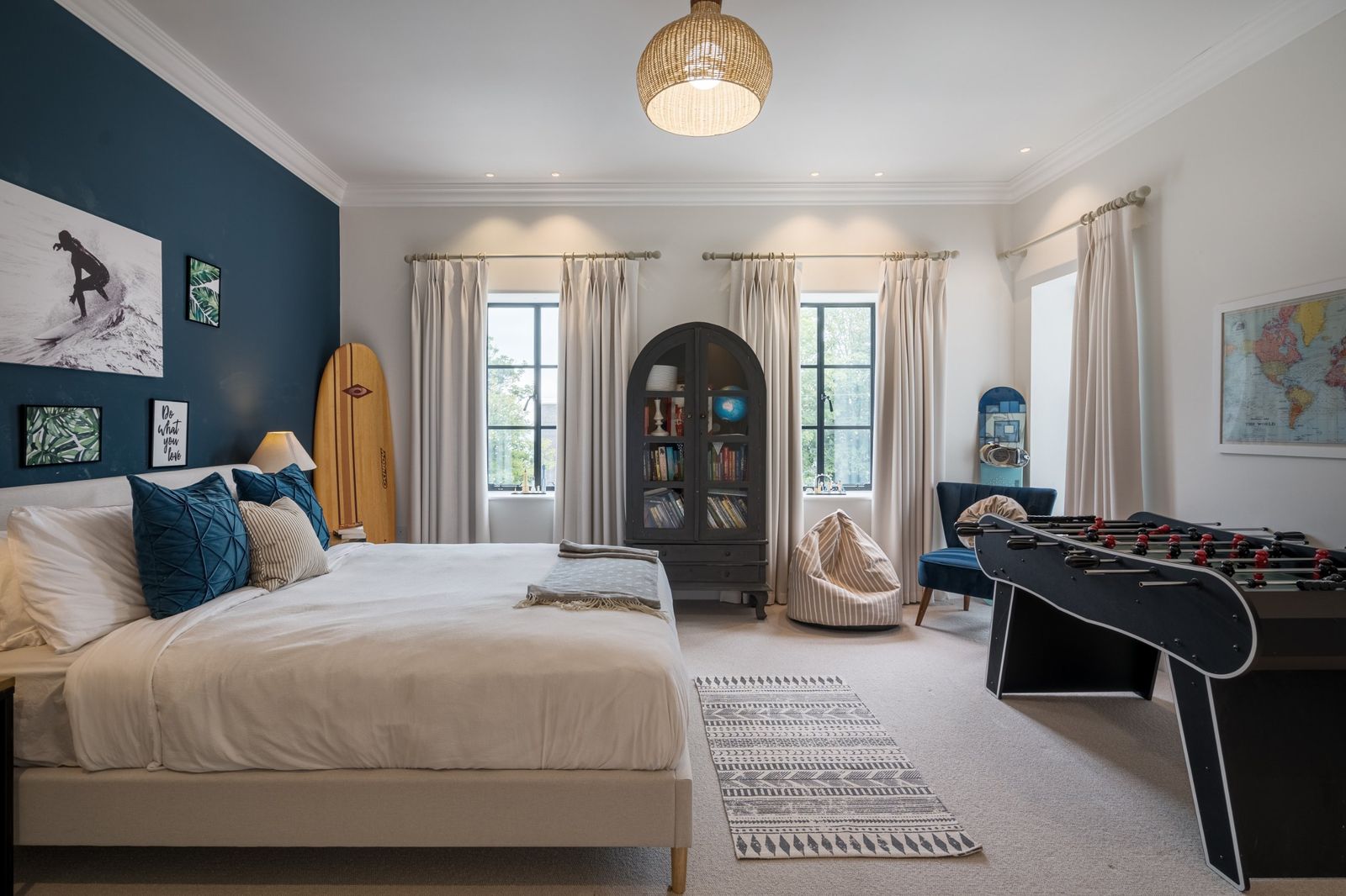 The surf bedroom with a football table