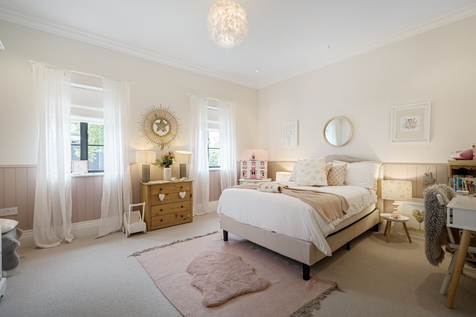 A pink-panelled bedroom