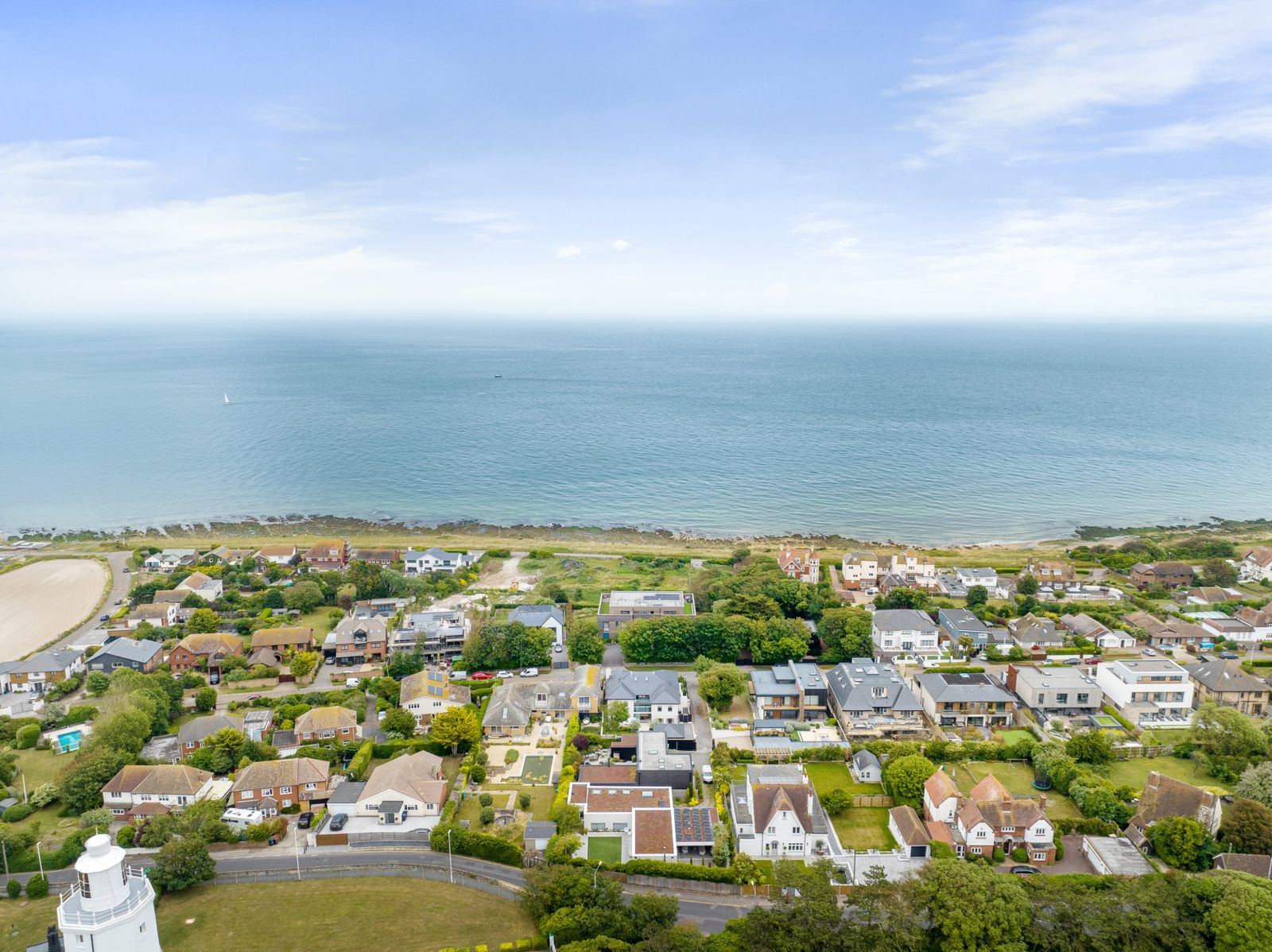 The coastline from the air, with the lighthouse below